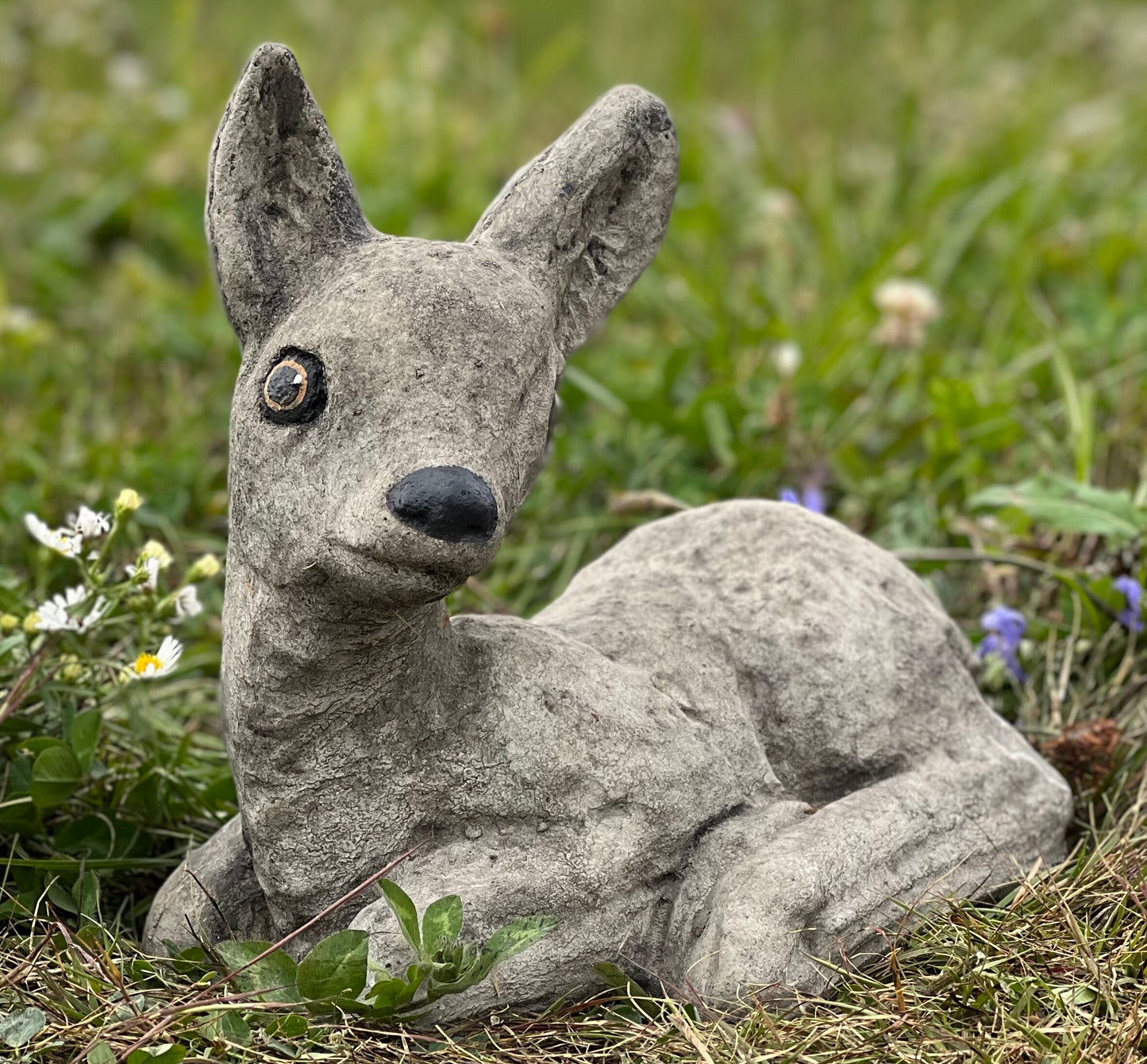 Deer laying statue