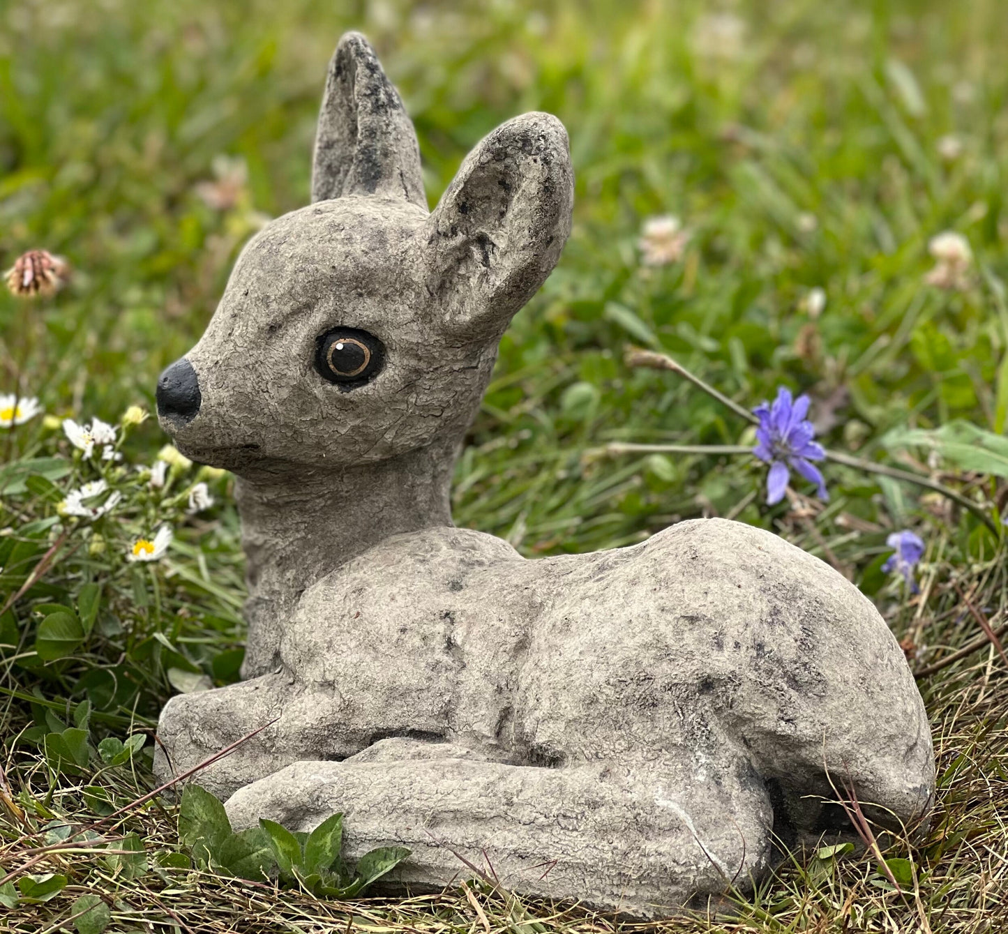 Deer laying statue