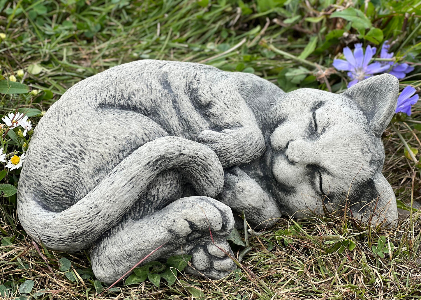 Laying cat statue