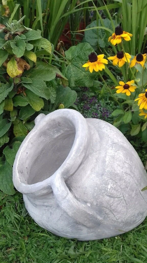 Concrete flower pot statue