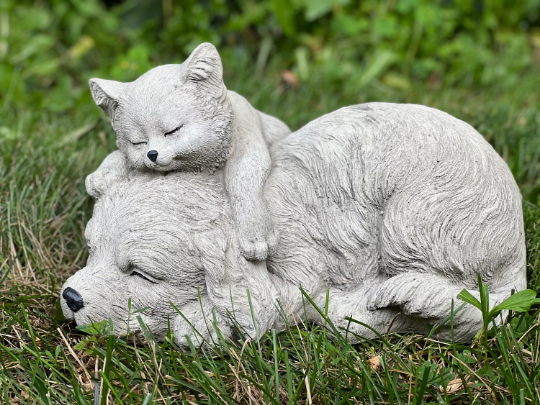 Sleeping cat and dog statue