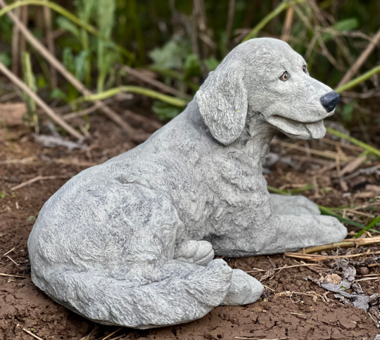 Laying Labrador Retriever sculpture