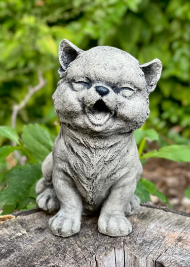 Smilling sitting cat figurine