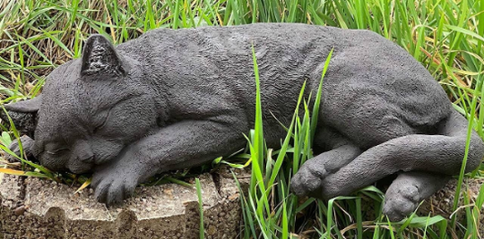 Sleeping cat concrete statue