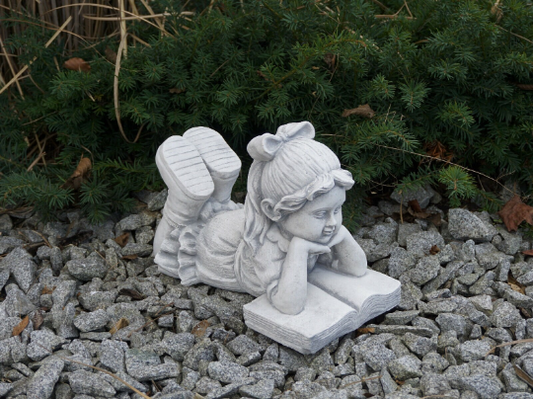 Large reading girl statue