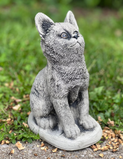 Concrete sitting cat statue