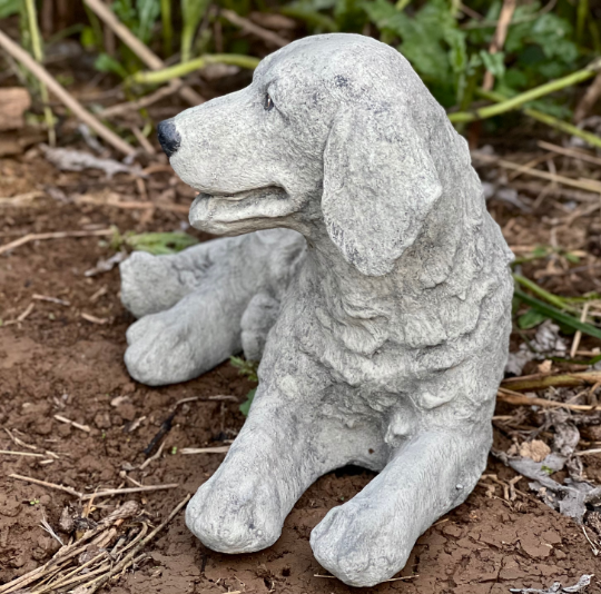 Laying Labrador Retriever sculpture