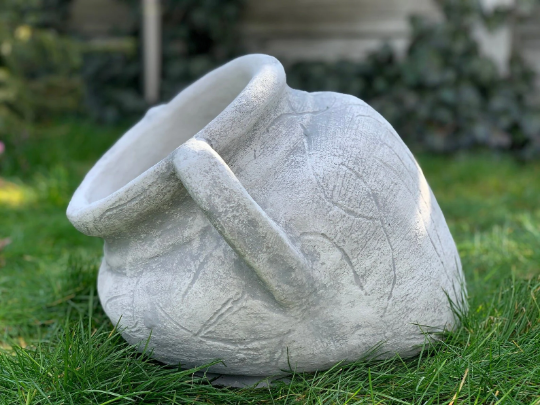 Concrete flower pot statue