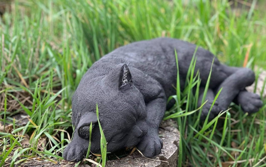 Sleeping cat concrete statue