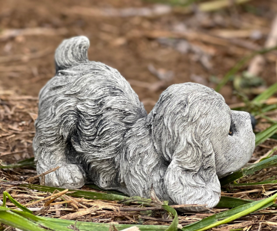 Concrete cocker spaniel statue