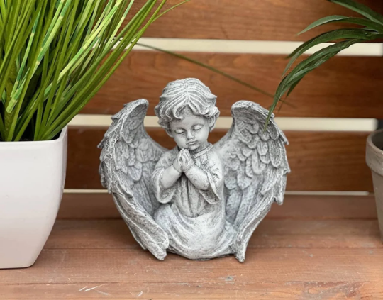 Praying angel figurine