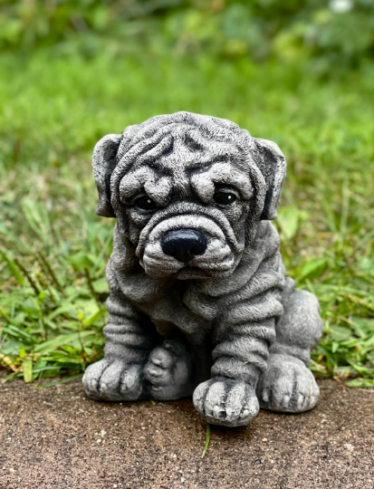 Sitting rottweiler statue