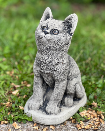 Concrete sitting cat statue