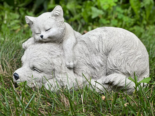 Sleeping cat and dog statue