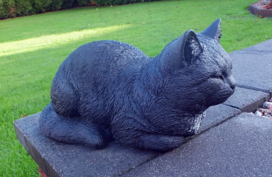 Concrete black cat figurine