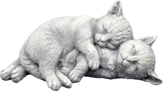 Two sleeping cats statue