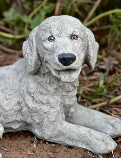 Laying Labrador Retriever sculpture