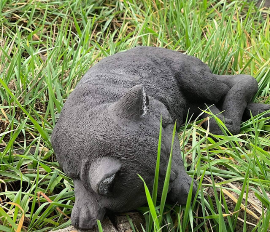 Sleeping cat concrete statue