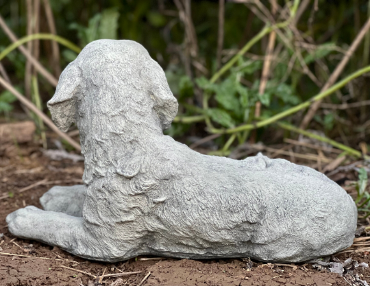 Laying Labrador Retriever sculpture