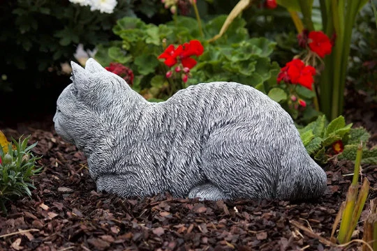 Cat sleeping concrete statue