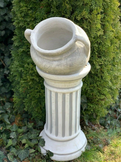 Concrete flower pot statue