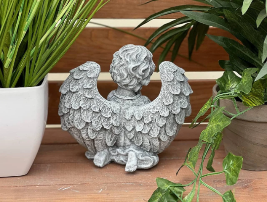 Praying angel figurine