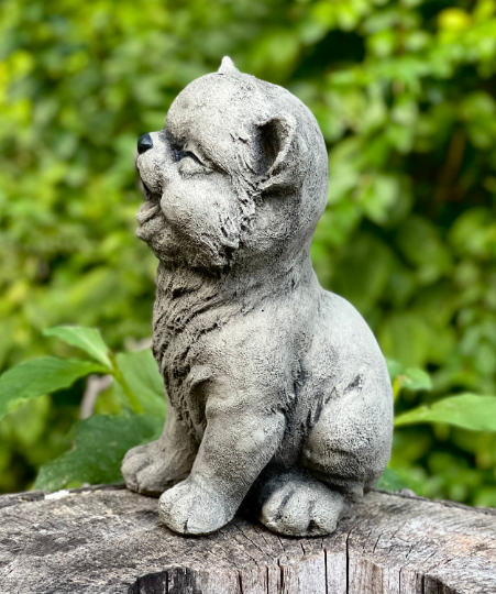 Smilling sitting cat figurine