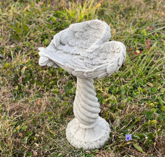 Bird bath wings of an angel statue