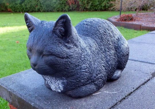 Concrete black cat figurine