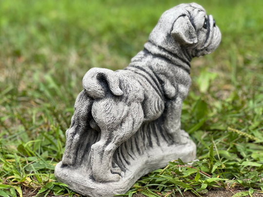 Standing pug on basement figure