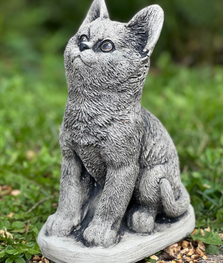 Concrete sitting cat statue