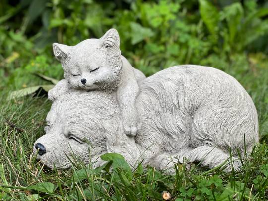 Sleeping cat and dog statue