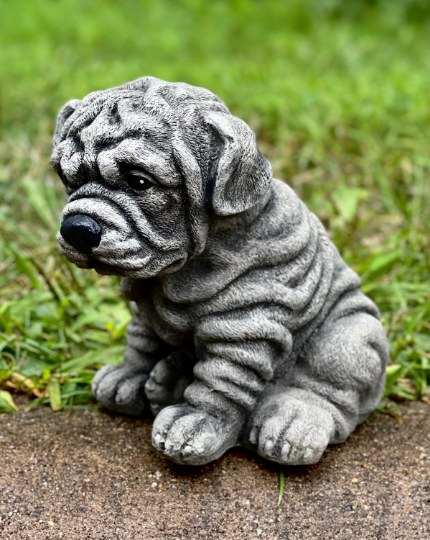 Sitting rottweiler statue