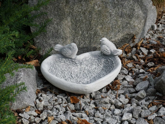 Concrete drinker for birds statue