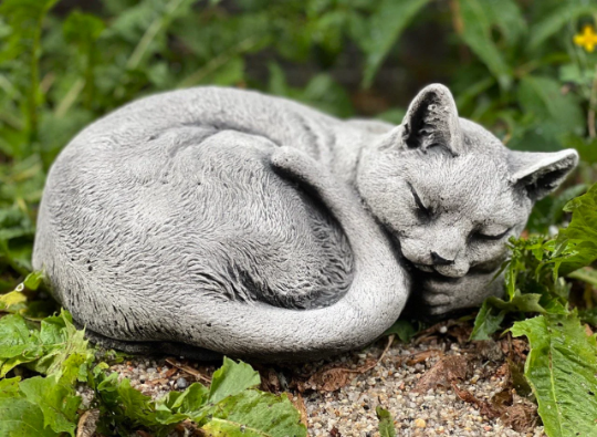 Concrete sleeping cat figurine