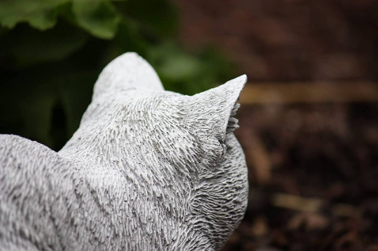 Sleeping curled up cat statue