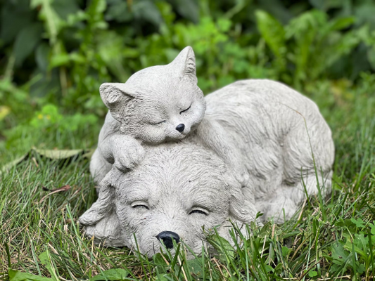 Sleeping cat and dog statue