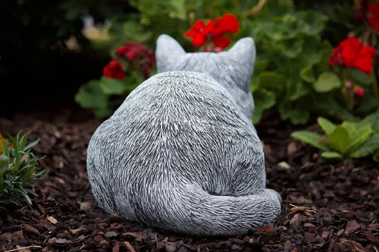 Cat sleeping concrete statue