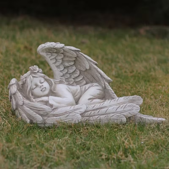 Sleeping angel figurine