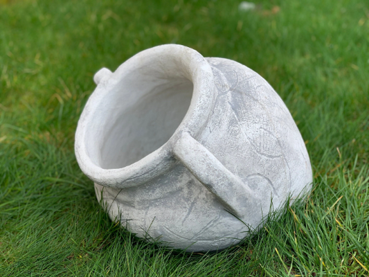 Concrete flower pot statue