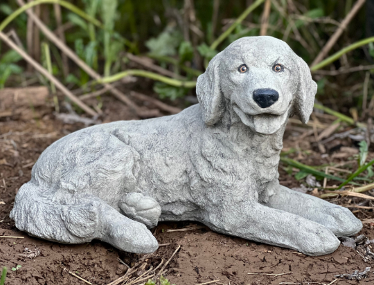 Laying Labrador Retriever sculpture