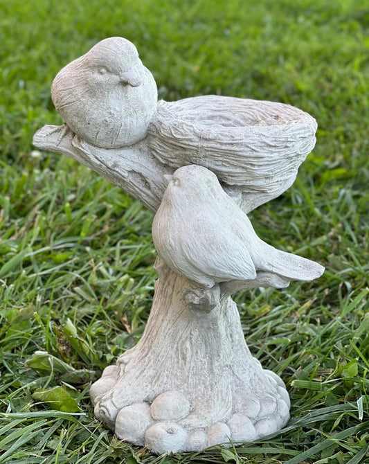 Drinker for birds statue