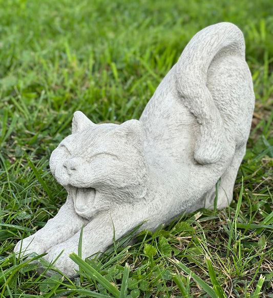 Stretching cat statue