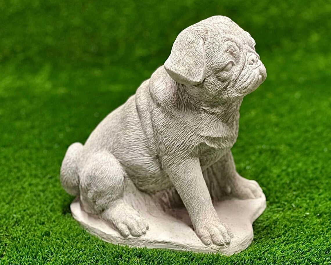 Sitting puppy pug concrete memorial