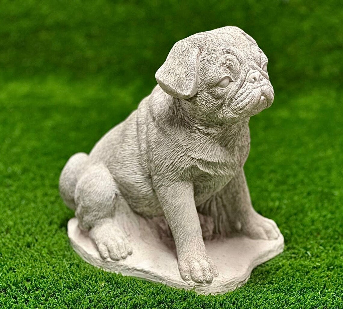 Sitting puppy pug concrete memorial