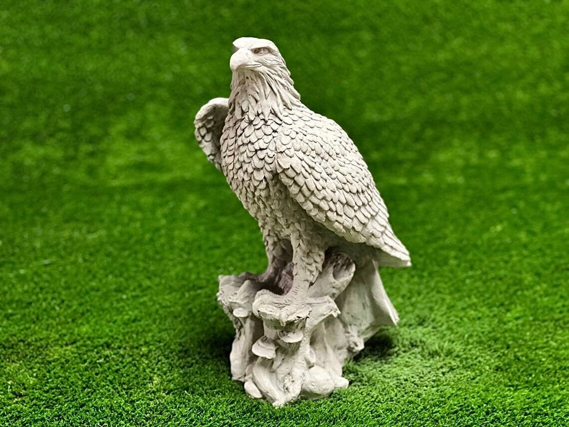 Eagle sitting on stump figure