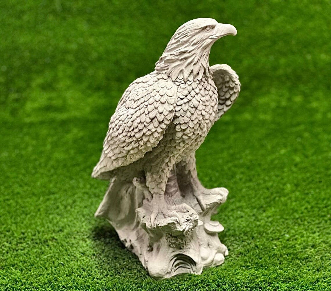 Eagle sitting on stump figure