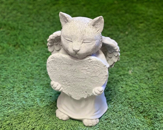 Concrete praying cat with wings