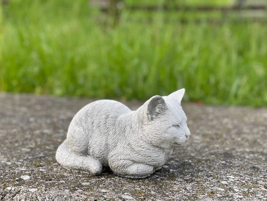 Resting cat statue