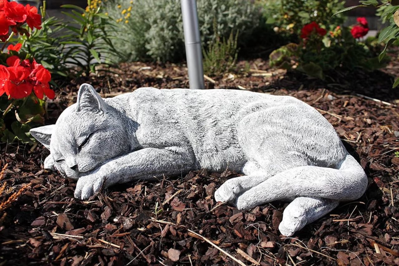 Resting kitty garden statue